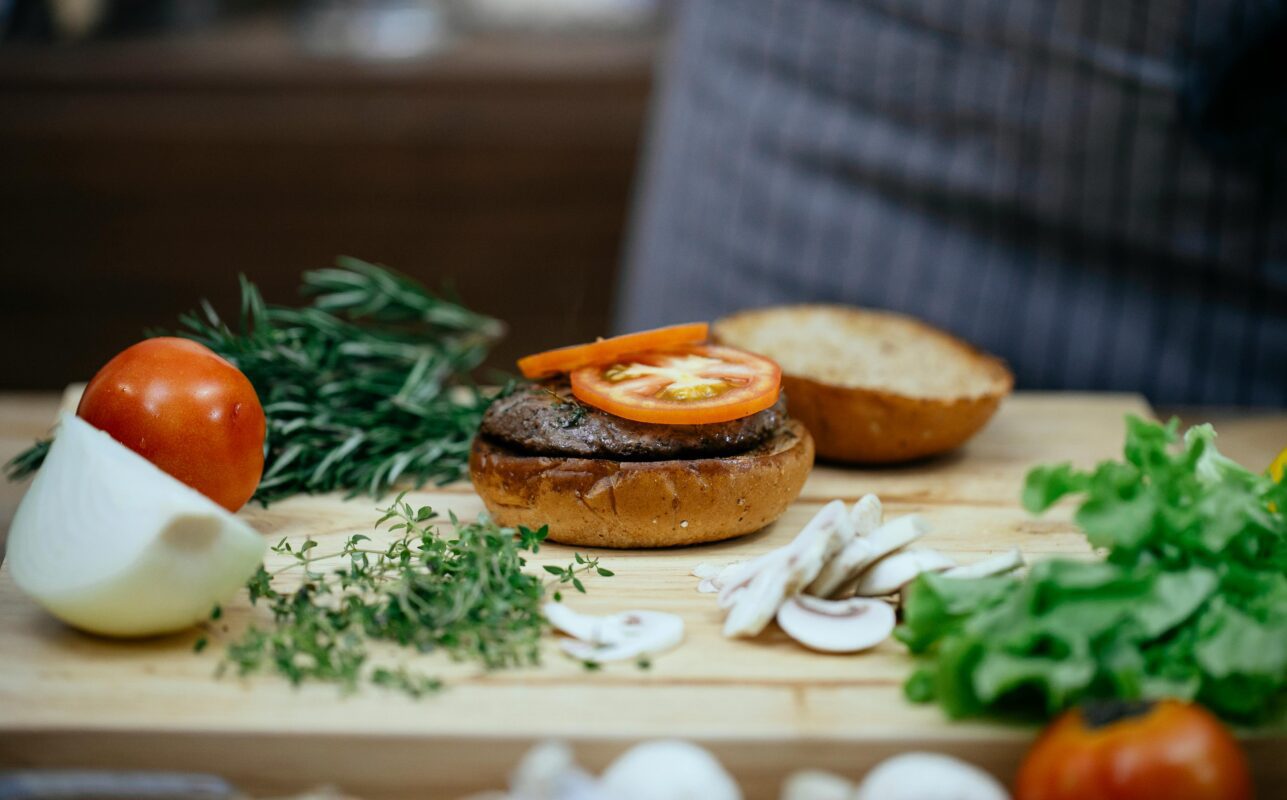 burger and veg in a table